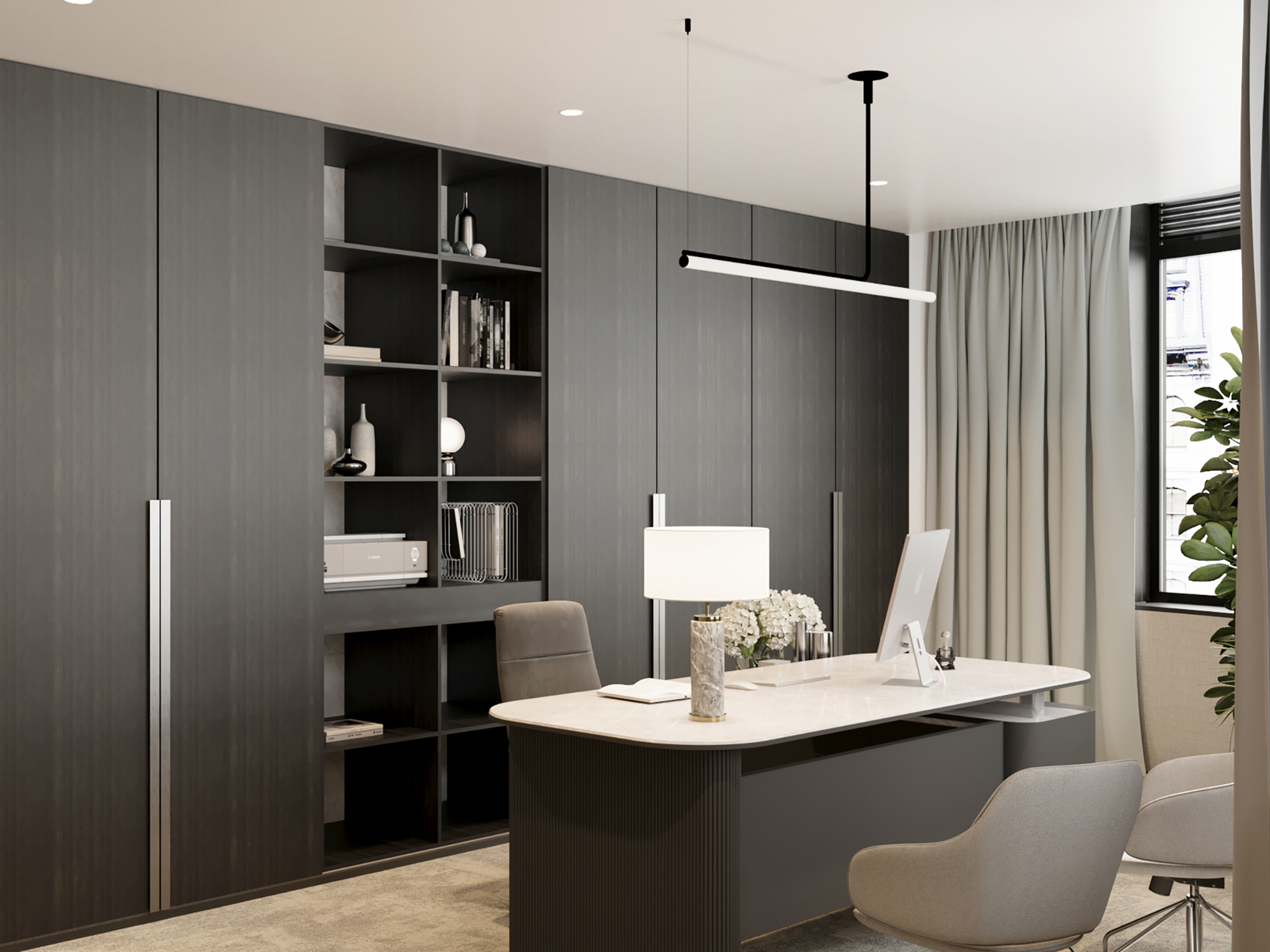 Private office with dark joinery and shelving, under a linear pendant light.