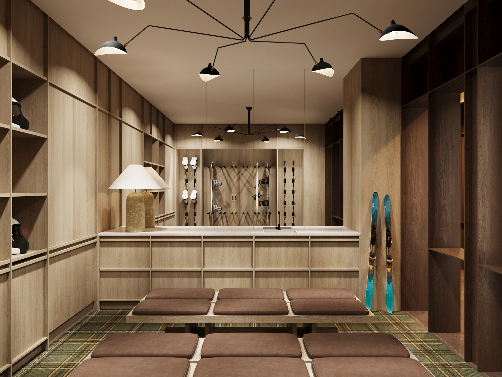 Ski room with fitted timber lockers, boot warmers and pendant lights over a tartan floor.