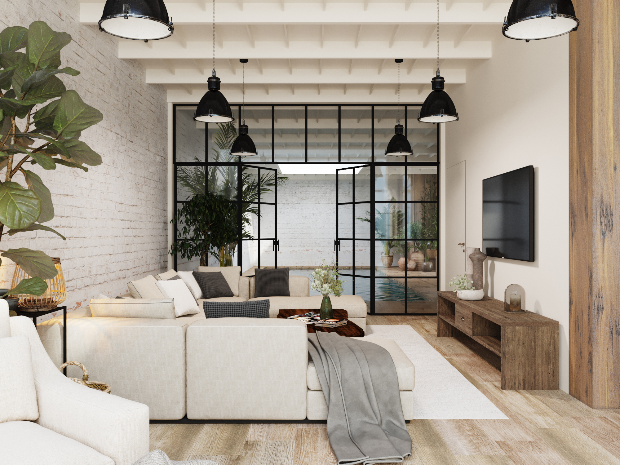 Living room with a white sectional sofa and black pendant lights, under exposed beams.