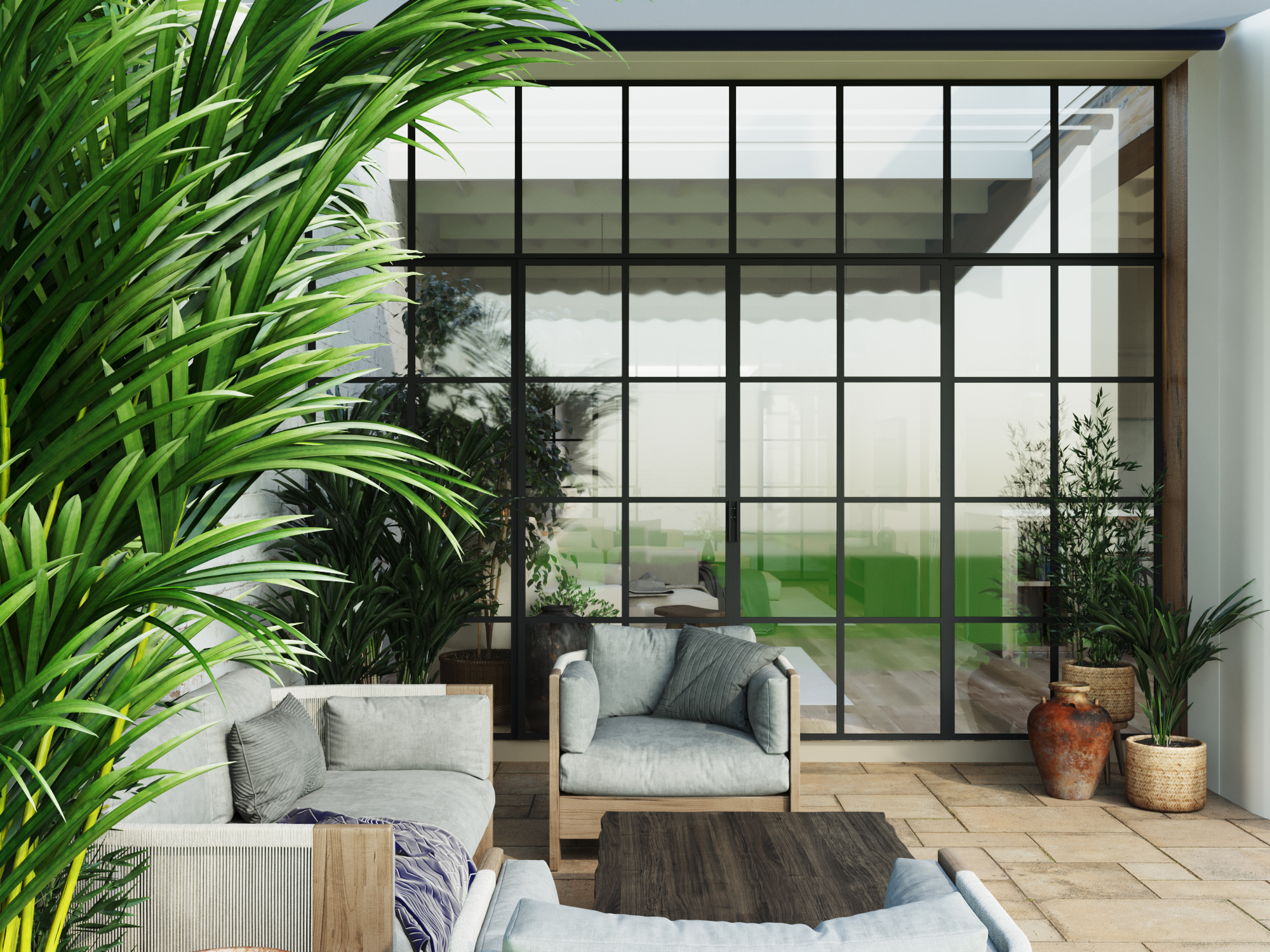 Covered terrace with an outdoor sofa and coffee table under a pergola.
