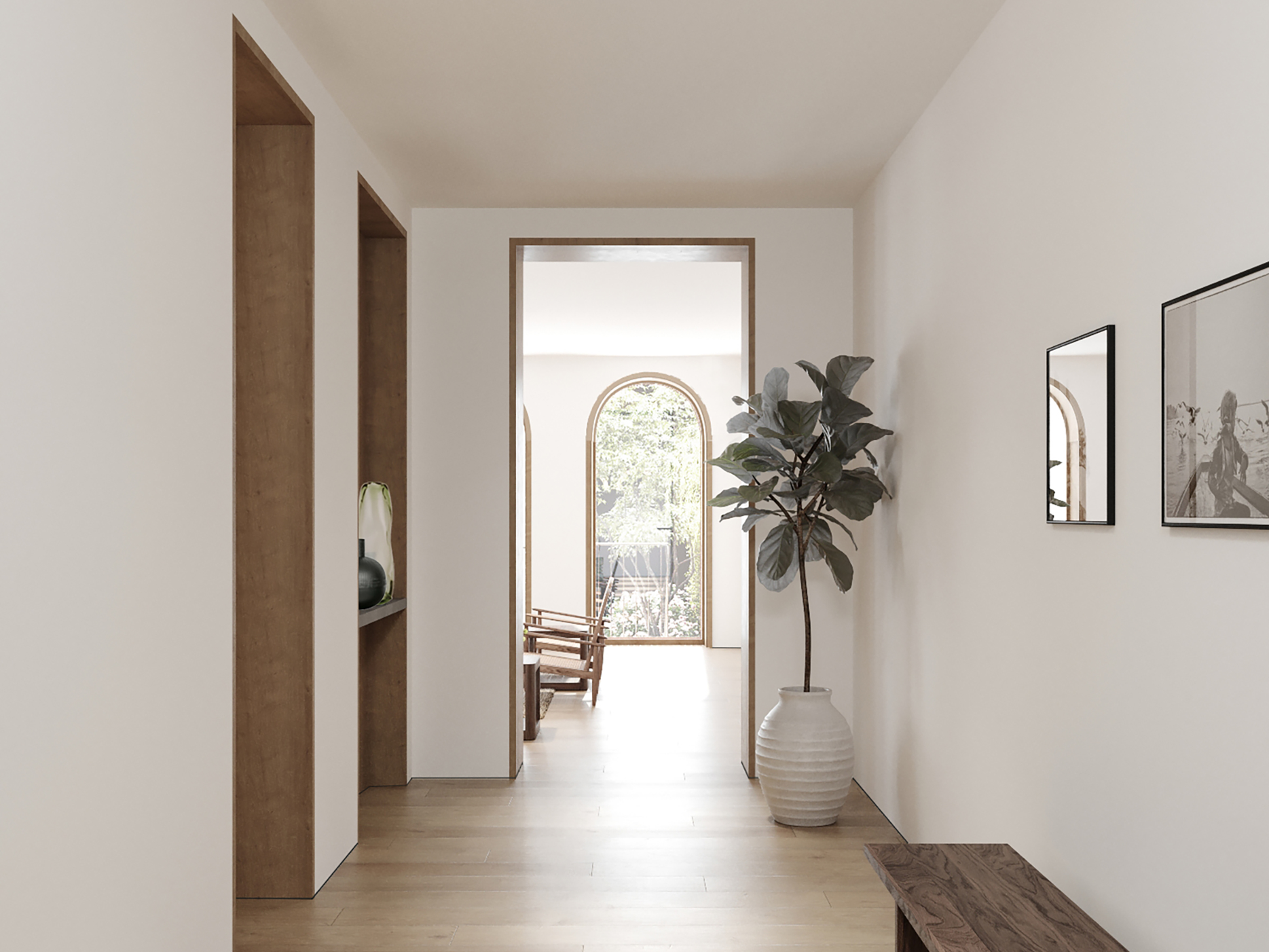 Hallway with a timber console and potted plant, looking through to an arched window.