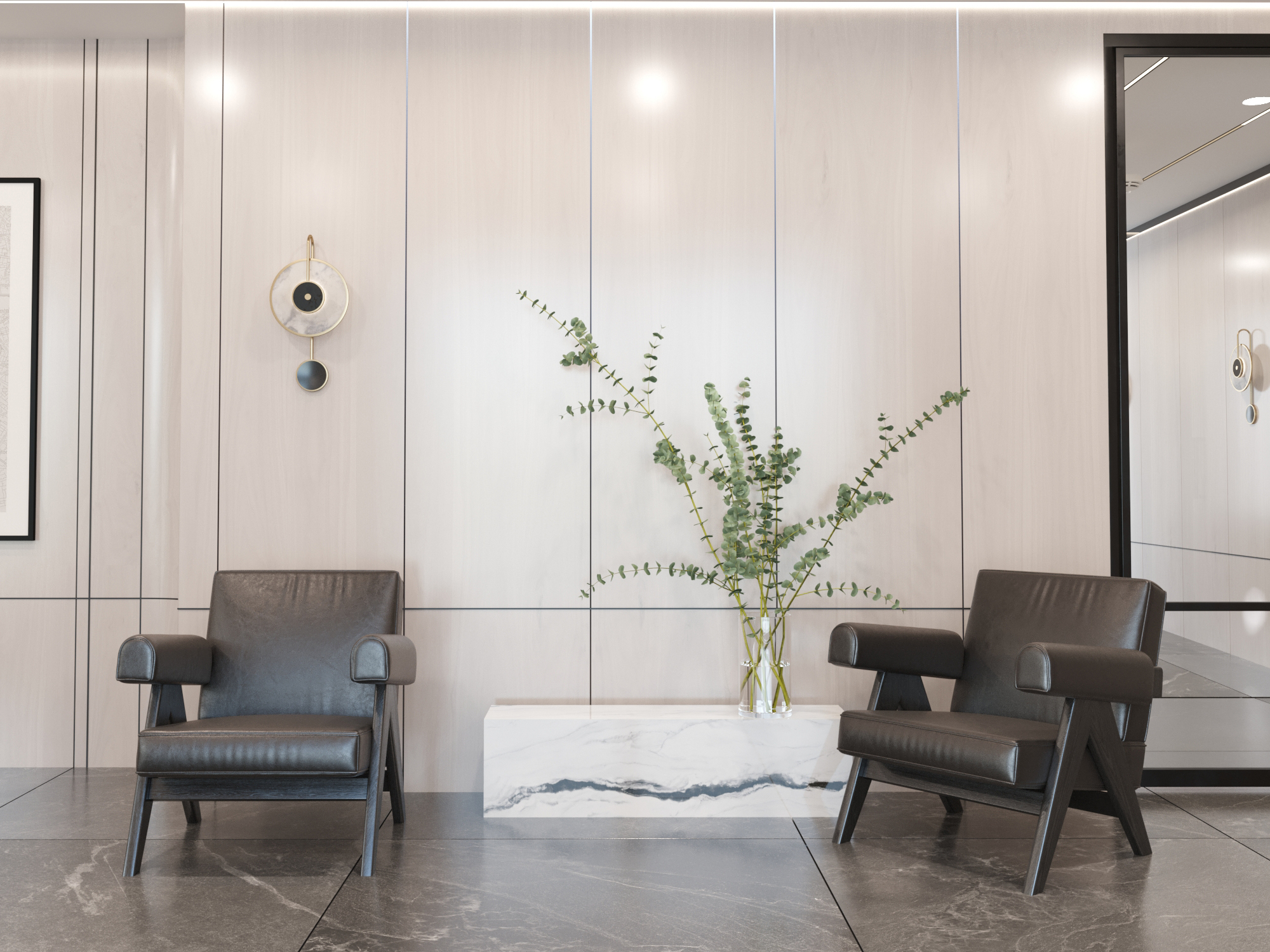 Lobby seating with two dark leather armchairs either side of a stone bench.