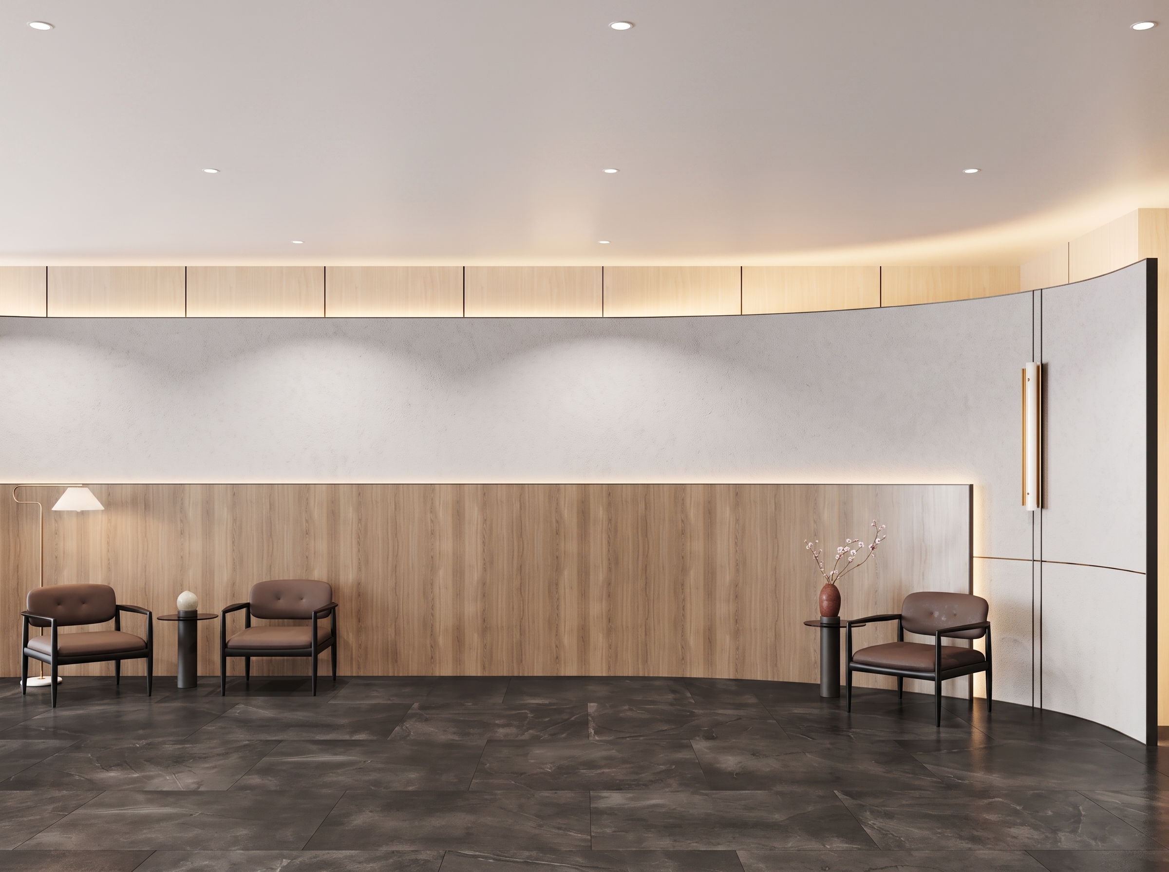 Waiting area with armchairs against a timber-clad wall, beside the curved counter.