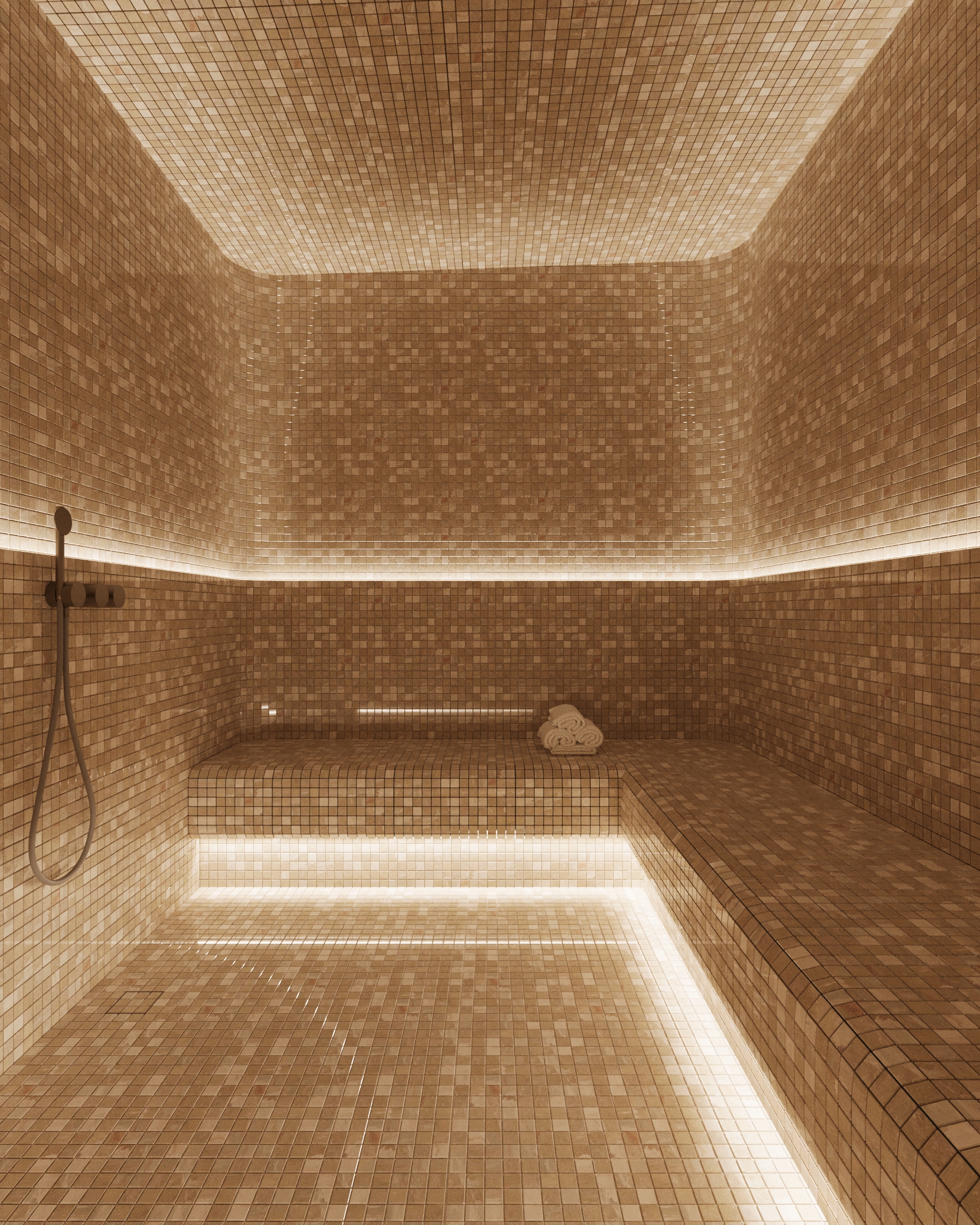 Steam room with mosaic-tiled benches under a vaulted ceiling and lit recesses.